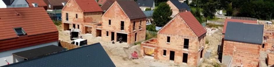 Construction de 31 logements en tuiles terre cuite, ardoise, brune et nuagé