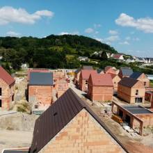 Construction de 31 logements en tuiles terre cuite, ardoise, brune et nuagé