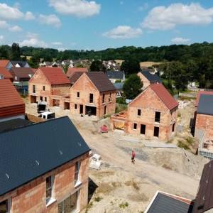 Construction de 31 logements en tuiles terre cuite, ardoise, brune et nuagé